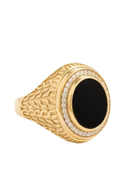 Anillo de caballero en 10 kilates con piedra negra y contorno de zirconias.png