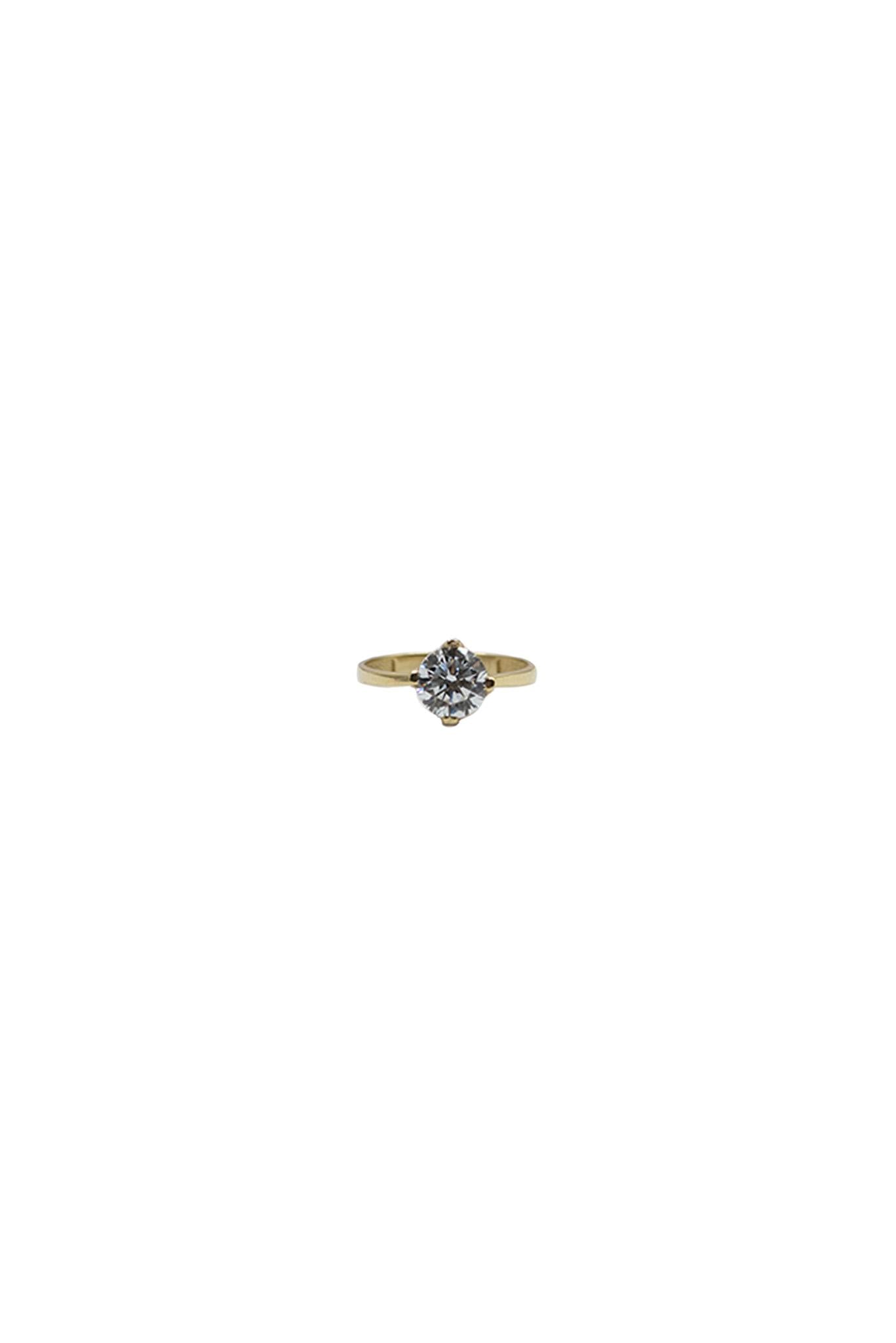 Anillo de compromiso de oro sólido en 10 kilates con una zirconia en medio .png