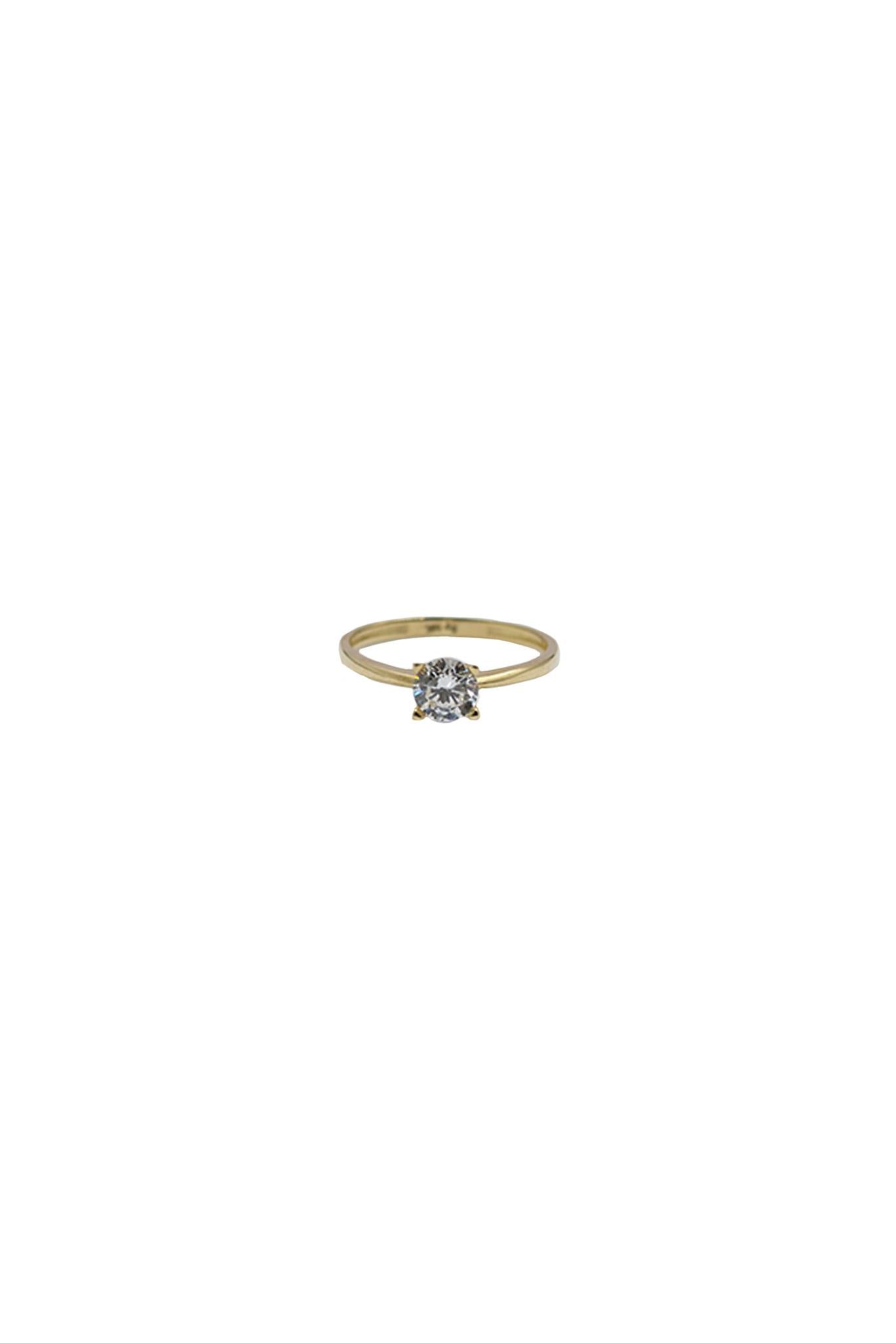 Anillo de compromiso de oro sólido en 10 kilates con una zirconia en medio .png
