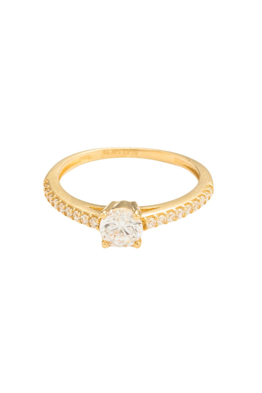 Anillo de compromiso en 14 kilates con zirconia central y brazo de zirconias.png