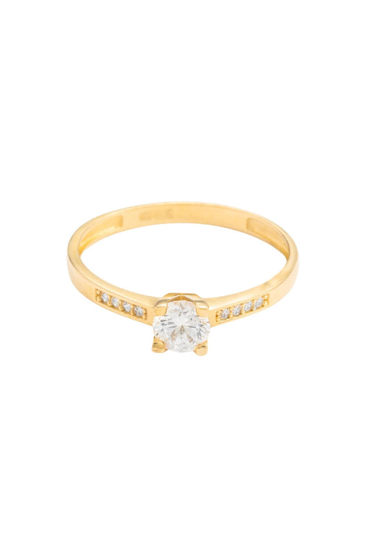 Anillo de compromiso en 14 kilates con zirconias laterales biseladas.png