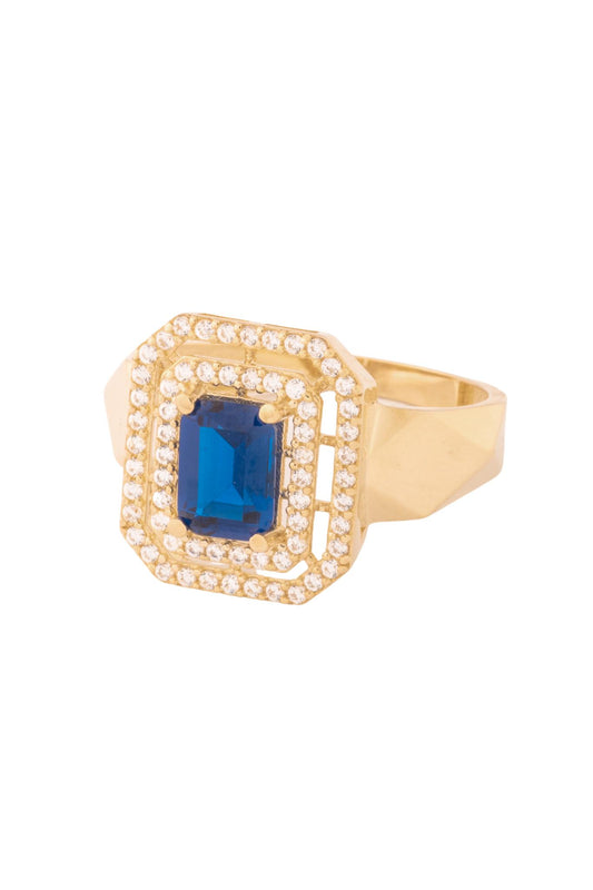 Anillo de oro solido en 10 kilates con contorno de bola de disco con un rectangular en el centro de dos linea de zirconias y en el centro una piedra azul.png