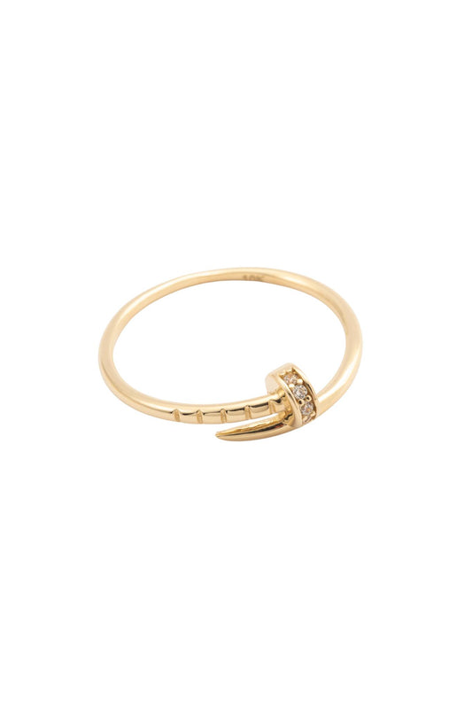 Anillo de oro sólido en 10 kilates con forma de clavo liso delgado y punta de zirconias..png