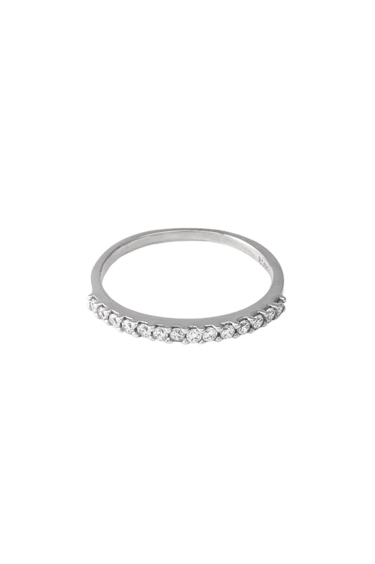 Anillo de oro sólido en 10 kilates con media churumbela de zirconias y uñas..png