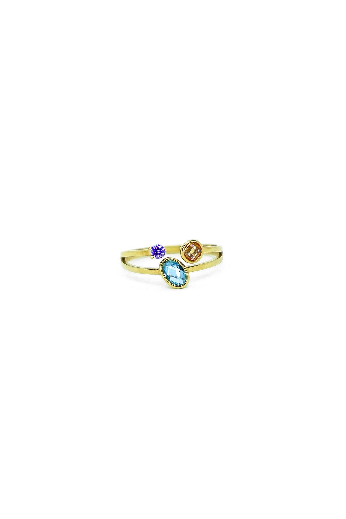 Anillo de oro solido en 10 kilates con tres piedras de color cafe, morada y azul.png