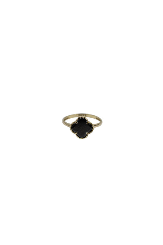 Anillo de oro sólido en 10 kilates con una flor de cuatro pétalos al centro negro onix.png