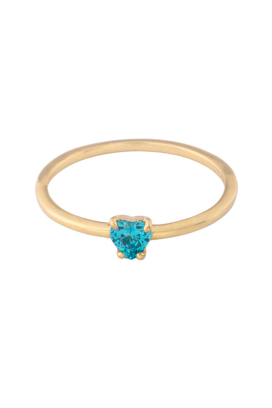 Anillo de oro solido en 10 kilates con una zirconia en forma de corazón en azul pastel.png