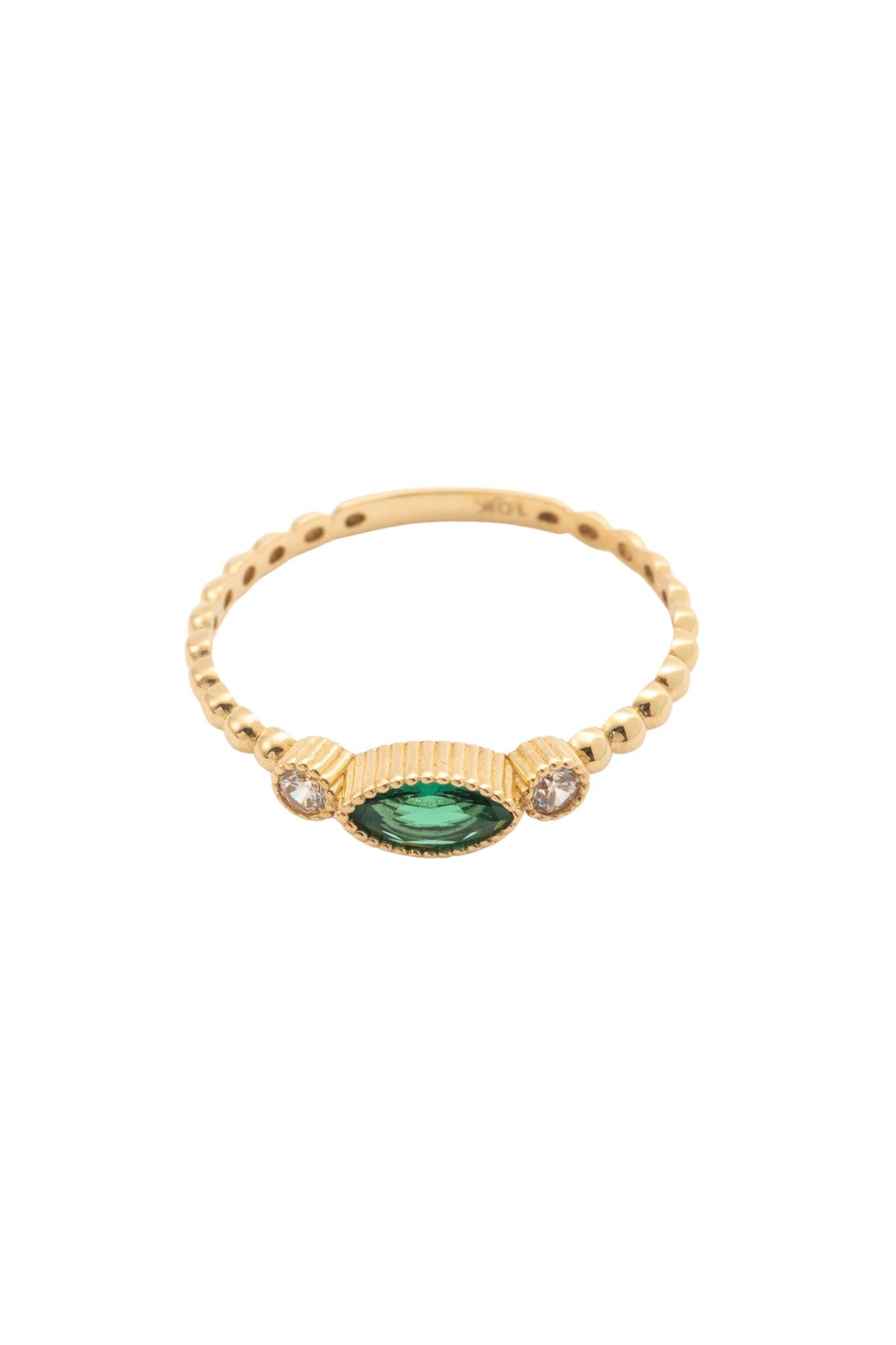 Anillo de oro sólido en 10 kilates con zirconia en forma de semilla verde y dos zirconias circulares a los lados y brazo de bolitas lisas..png