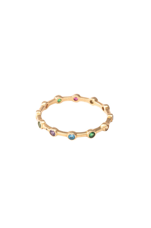 Anillo de oro sólido en 10 kilates con zirconias de colores biseladas separadas..png