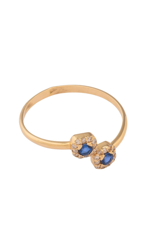 Anillo de oro sólido en 14 kilates con diamantes en forma de flores una arriba y una abajo, centro zafiro..png