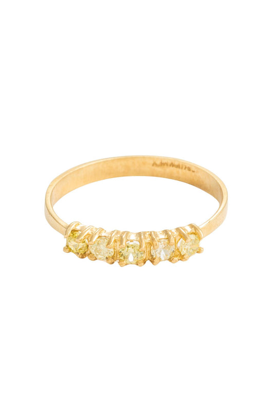 Anillo en 10 kilates con cinco zirconias verdes pera.png