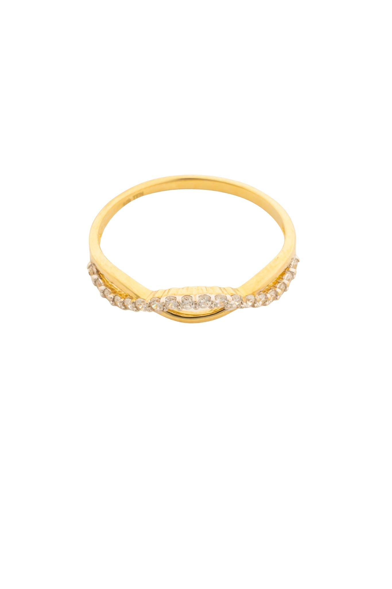 Anillo en 10 kilates con doble brazo liso y zirconias.png