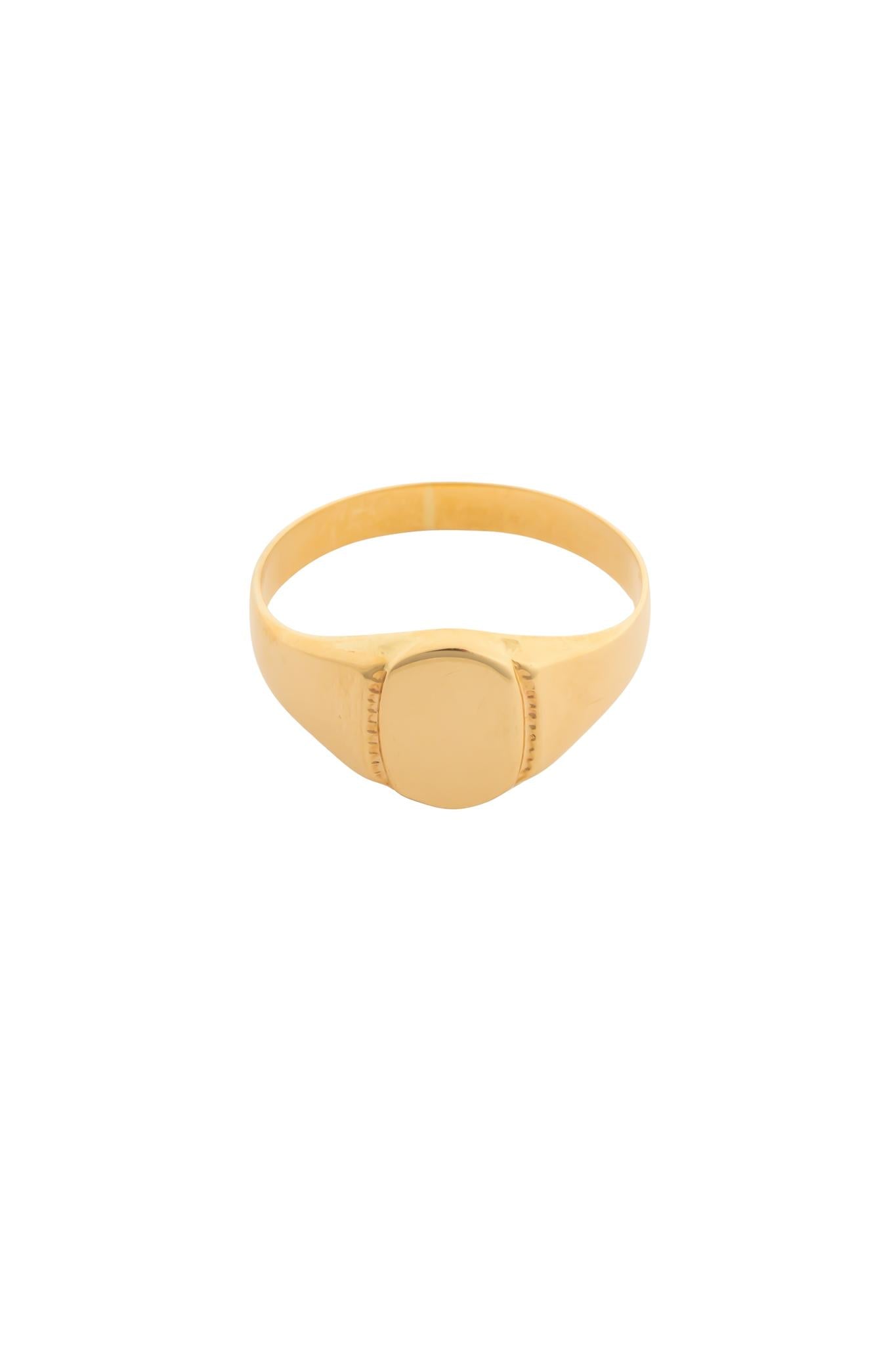 Anillo en 10 kilates con óvalo liso para grabado.png