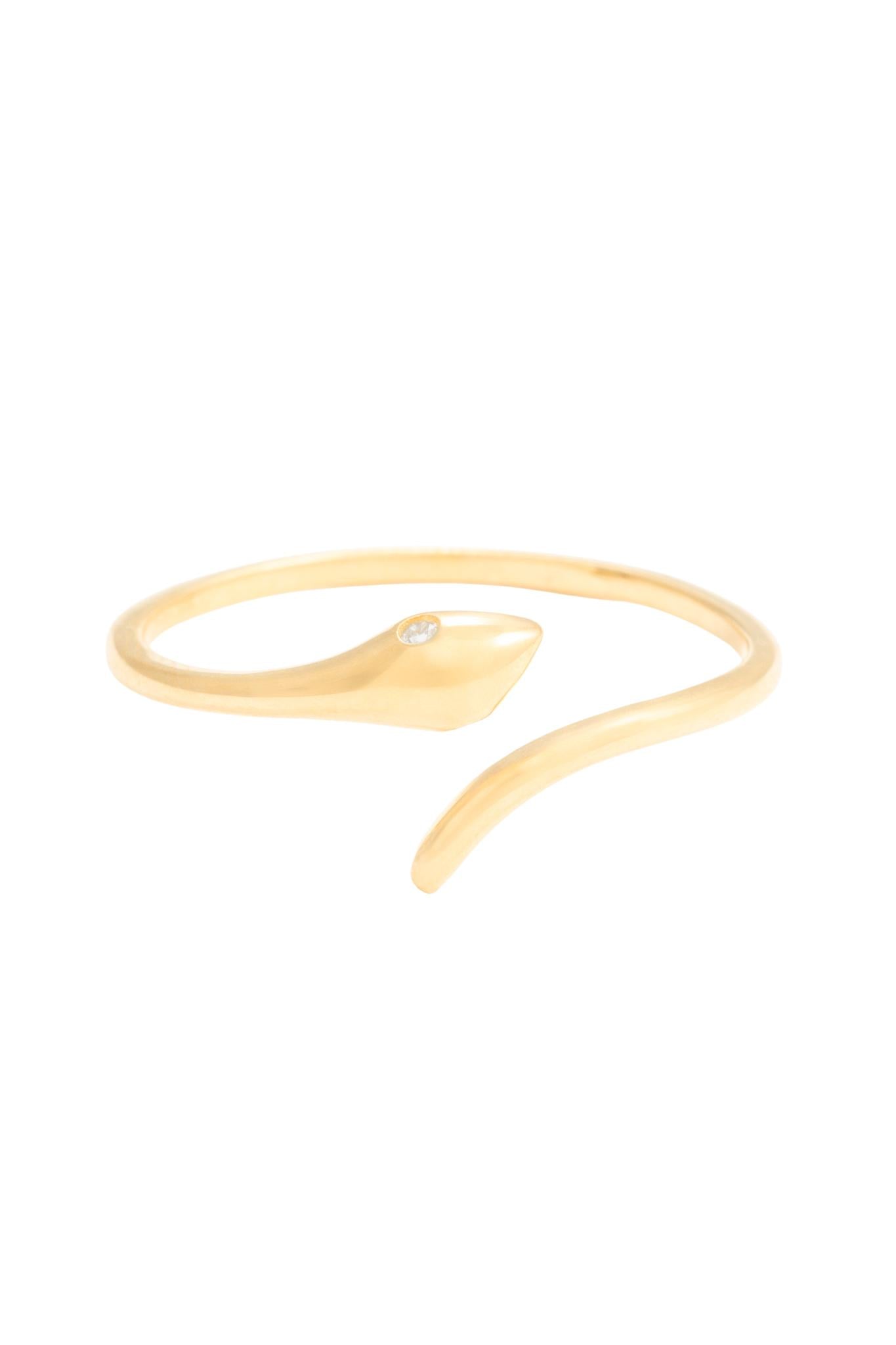 Anillo en 10 kilates con serpiente lisa y ojos de zirconias blancas.png