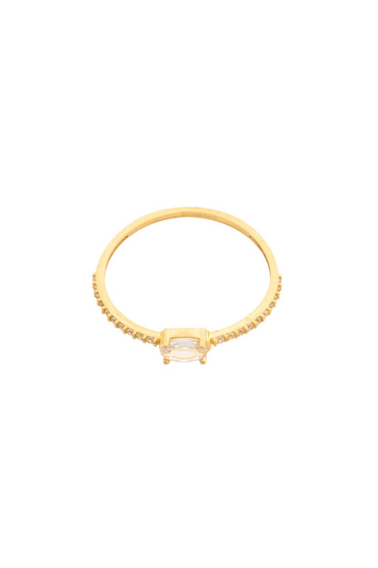 Anillo en 10 kilates con zirconias y zirconia ovalada blanca.png