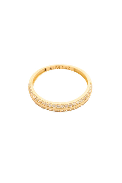 Anillo en 14 kilates con zirconia y línea dorada.png