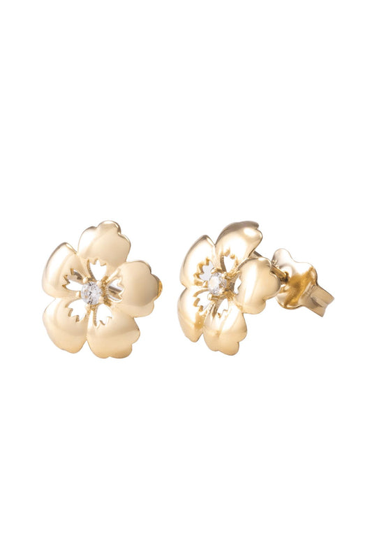 Arete de oro solido en10 kilates con forma de flor 5 petalos con zirconia en el centro .png