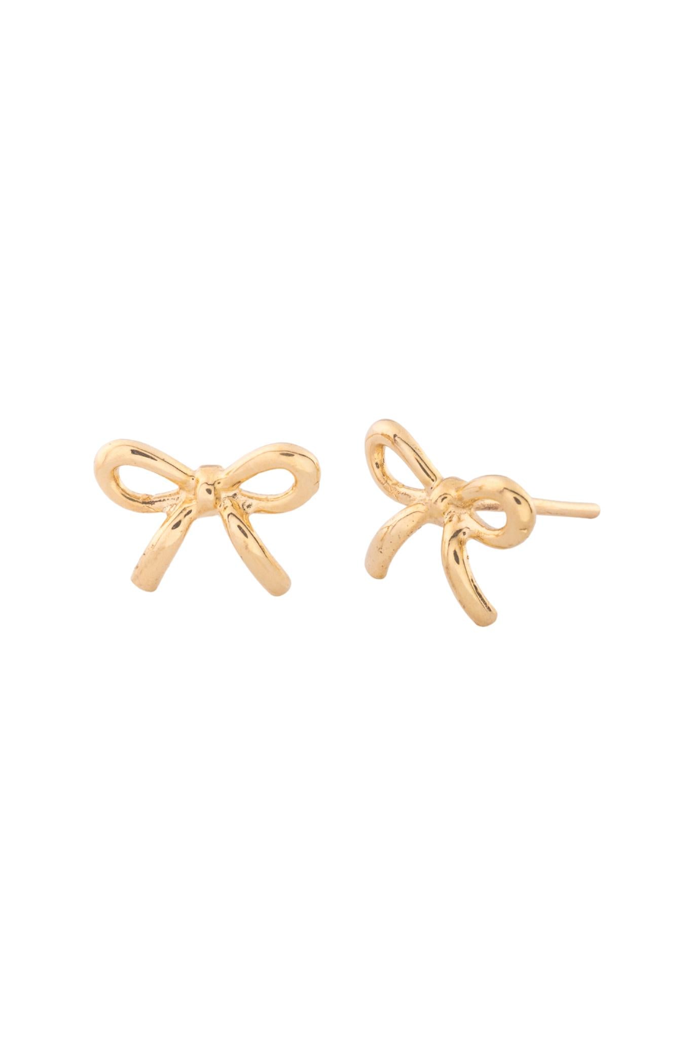 Arete de oro sólido en 10 kilates con forma de moño liso en oro amarillo..png