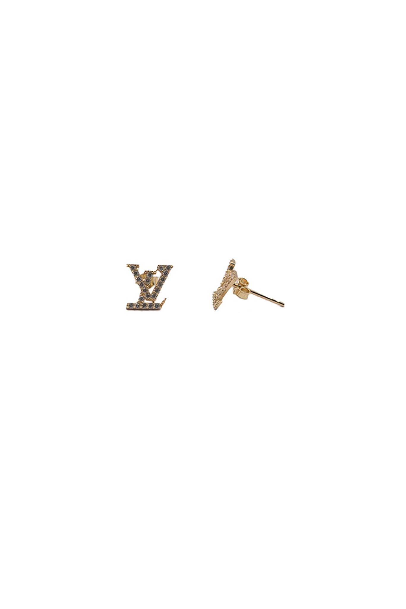 Arete de oro sólido en 10 kilates con una LV con zirconias.png
