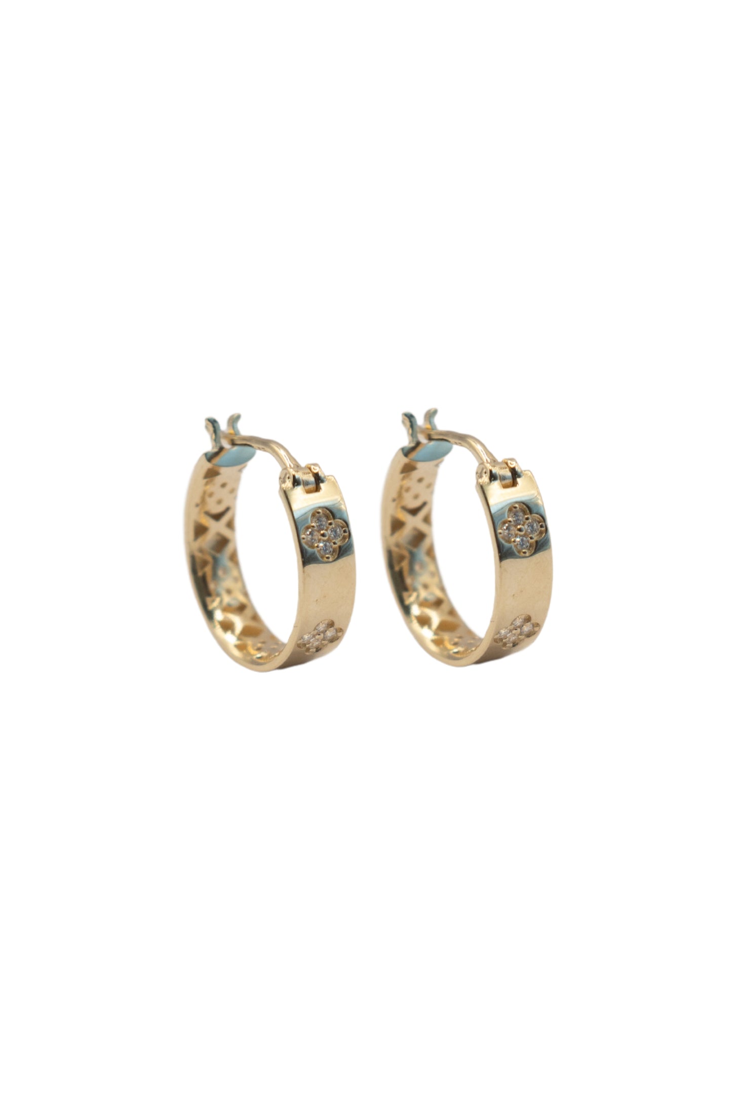 Arracada 10 kilates flores zirconia dispersas grandes..png