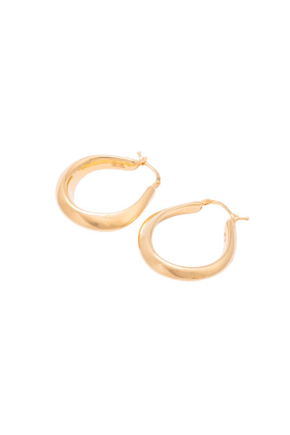 Arracada de oro sólido en 14 kilates con forma de U inflada irregular..png