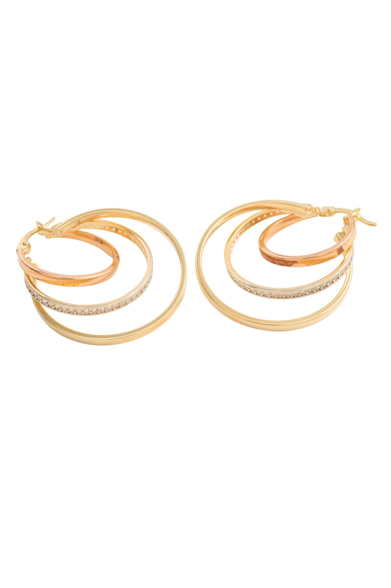 Arracada en 10 kilates con tres aros y zirconias.png