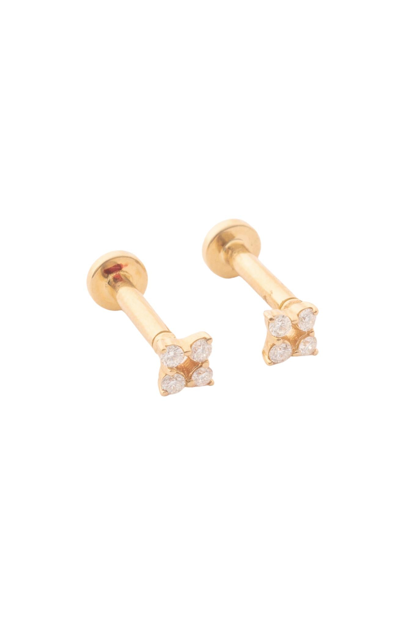 Broquel de oro sólido en 14 kilates con diamante en forma de flor D: 0.048 CT montado en oro amarillo..png