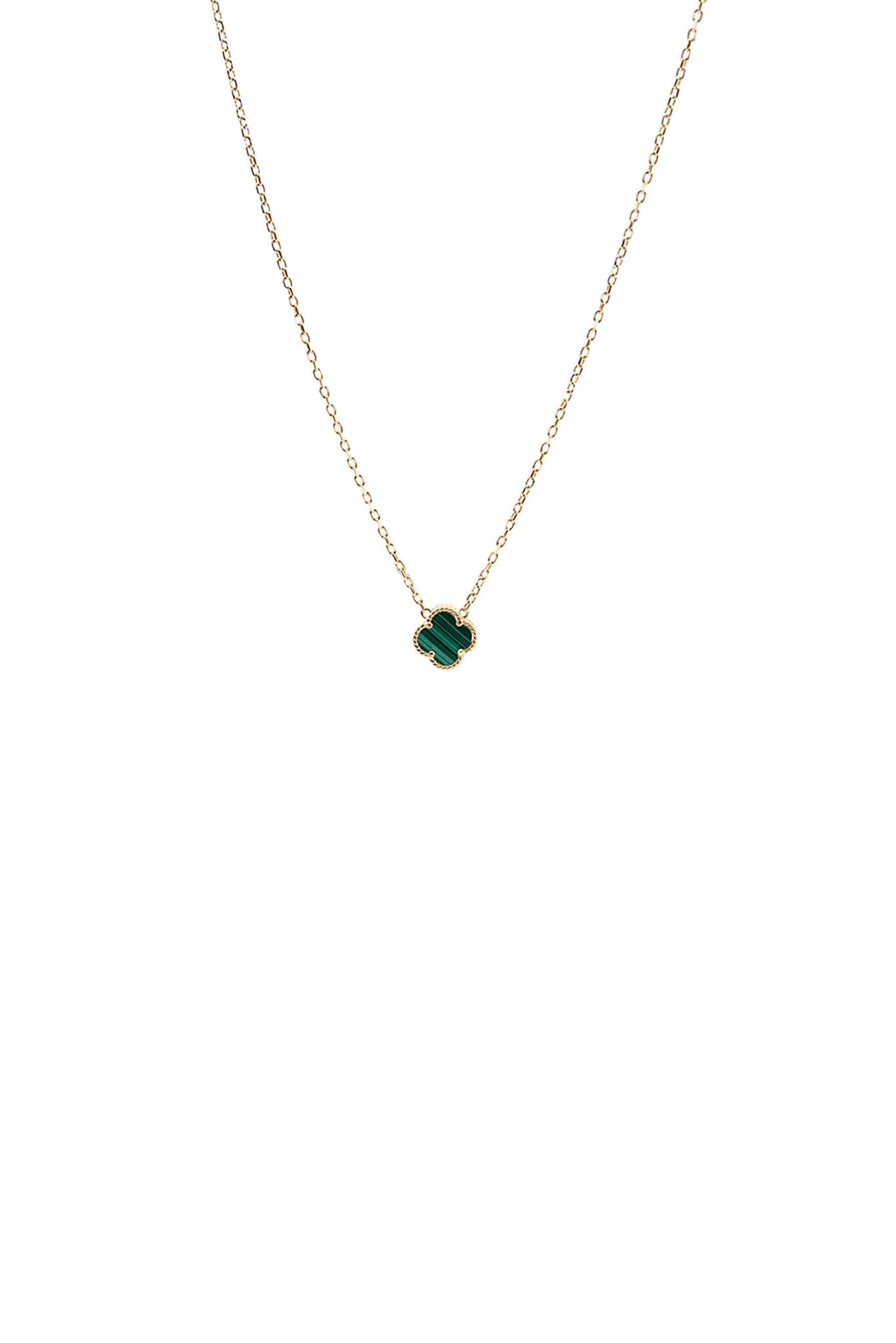 Collar de oro solido de 14 kilates con una flor verde al finalizar.png