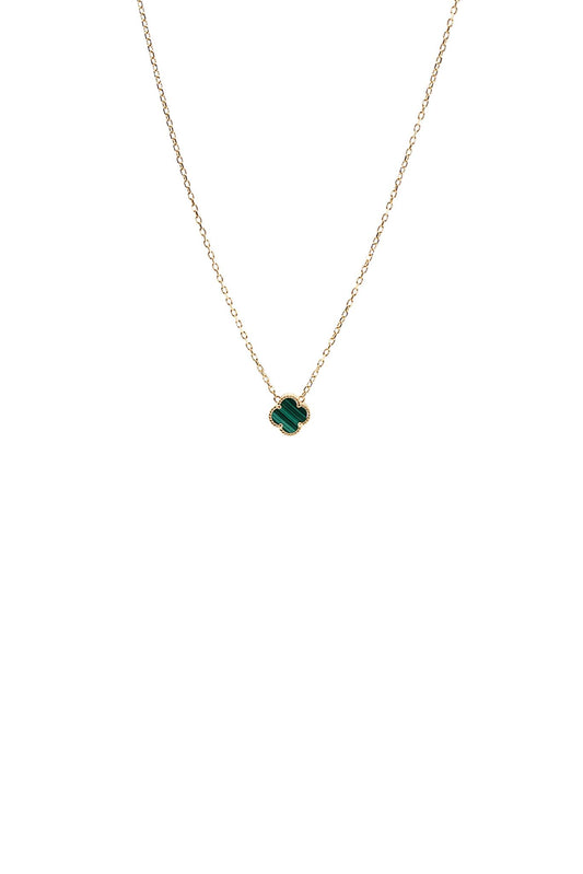 Collar de oro solido de 14 kilates con una flor verde al finalizar.png