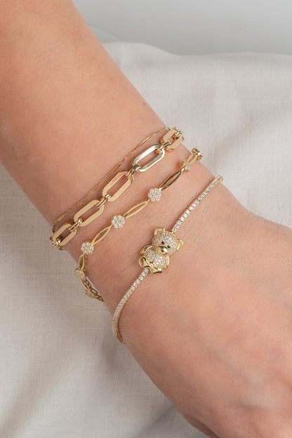 Pulsera de oro sólido en 10 kilates con eslabón 3D ovalado y unión óvalos lisos.