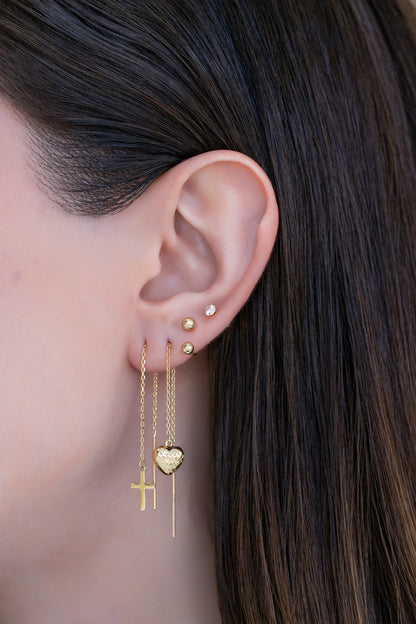 Arete violador 10 kilates, corazón inflado diamantado.