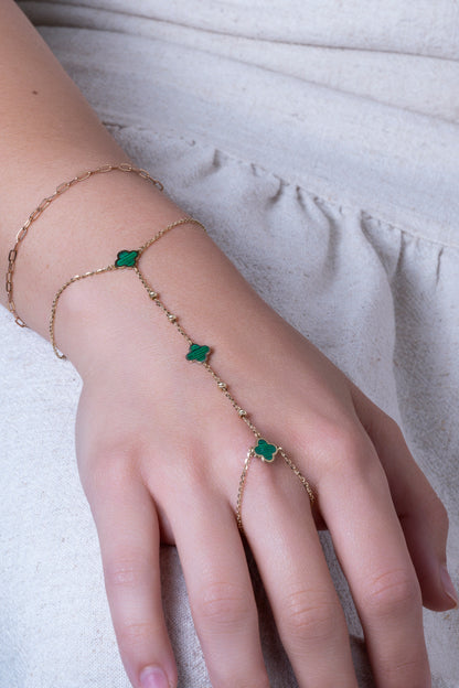 Pulsera handchain 10 kilates flores verdes y bolitas.