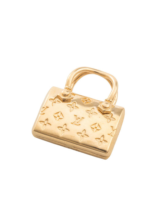 Dije 10 kilates forma de bolsa y letras LV negras y al reverso flores lisas.png