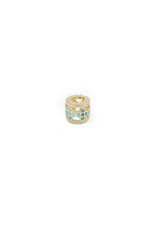 Dije charm 14 kilates cilindro con flores esmaltadas azul turquesa y orillas zirconias..png