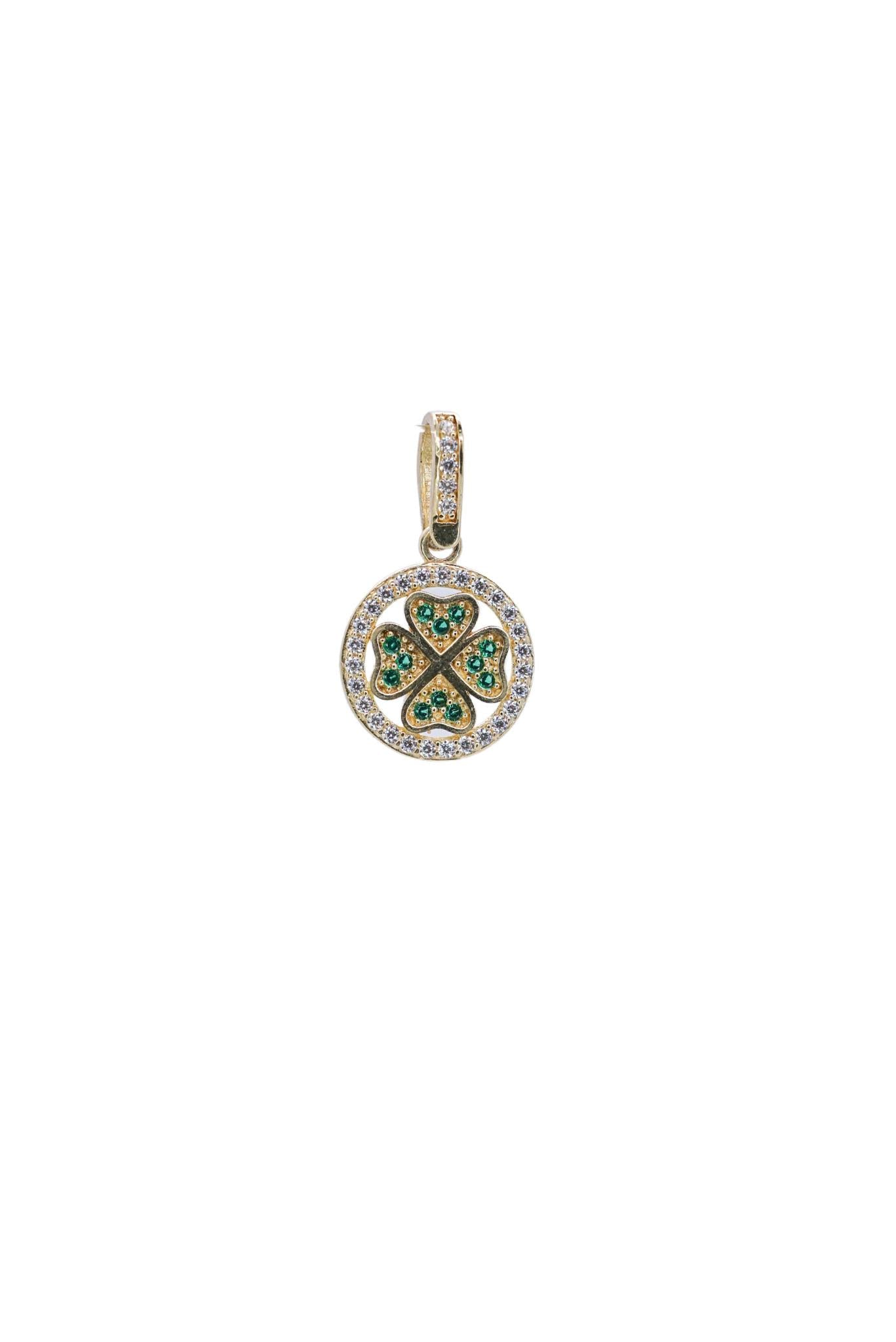 Dije de oro solido de 10 kilates con forma de trevol y zirconias de color verde y blancas.png