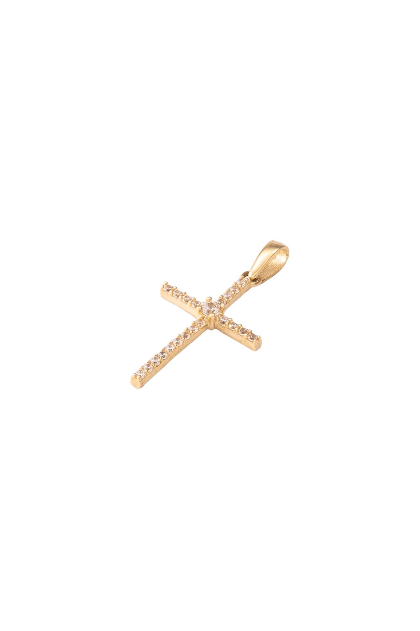 Dije de oro sólido en 10 kilates con forma de cruz delgada de zirconias y zirconia central grande..png
