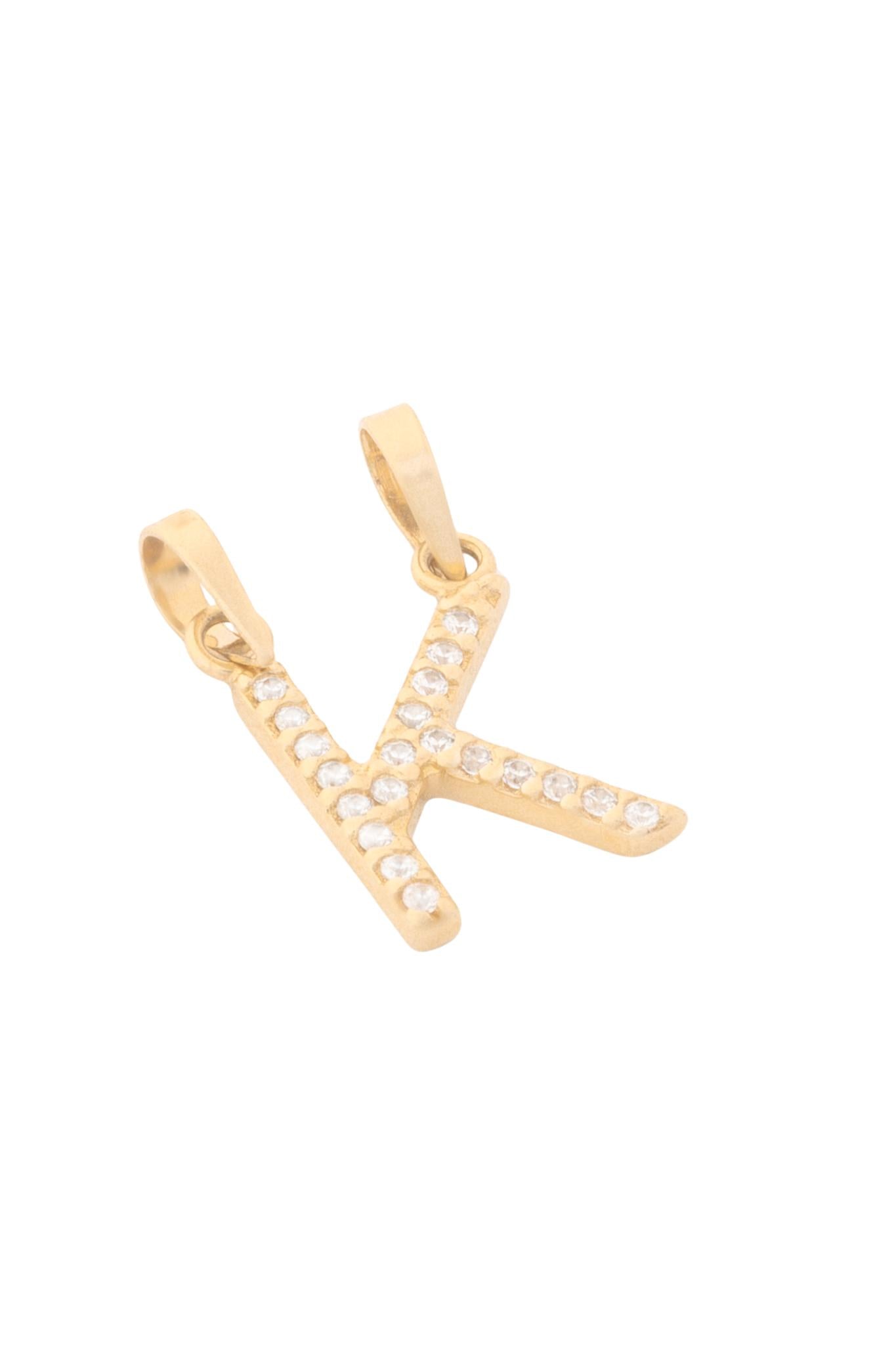 Dije de oro sólido en 10 kilates con forma de inicial de zirconias "K".png