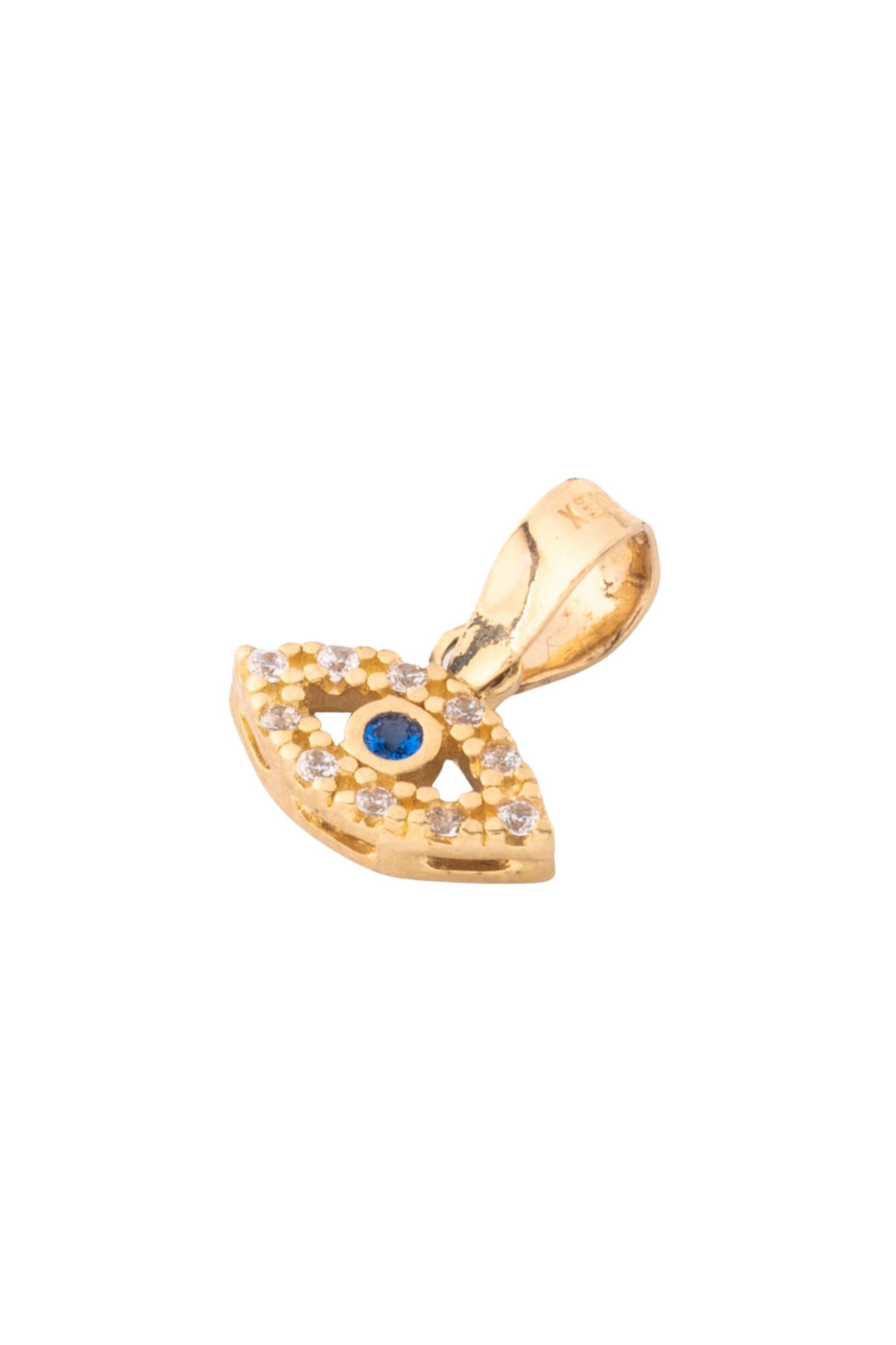 Dije de oro solido en 10 kilates con forma de ojo y un contorno de zirconia y un punto en el centro azul.png