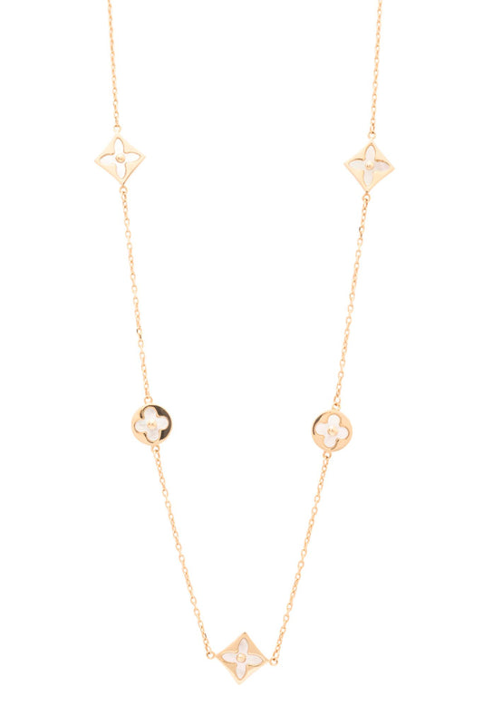 Gargantilla 10 kilates cuatro dijes de flores de cuatro pétalos con fondo de madre perla y biselado.png