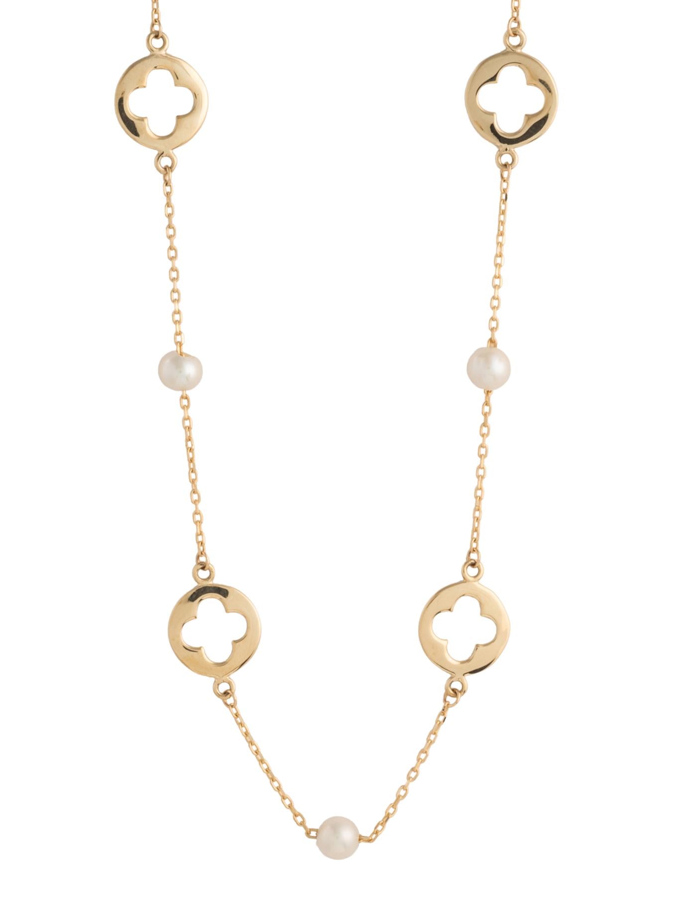 Gargantilla 10 kilates dijes circulares y centro flor.png