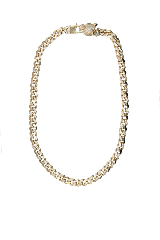 Gargantilla 10 kilates  eslabones tipo cubanos, uno liso y uno zirconias y broche con cabeza de pantera tupida zirconias, ojos zirconias verdes..png