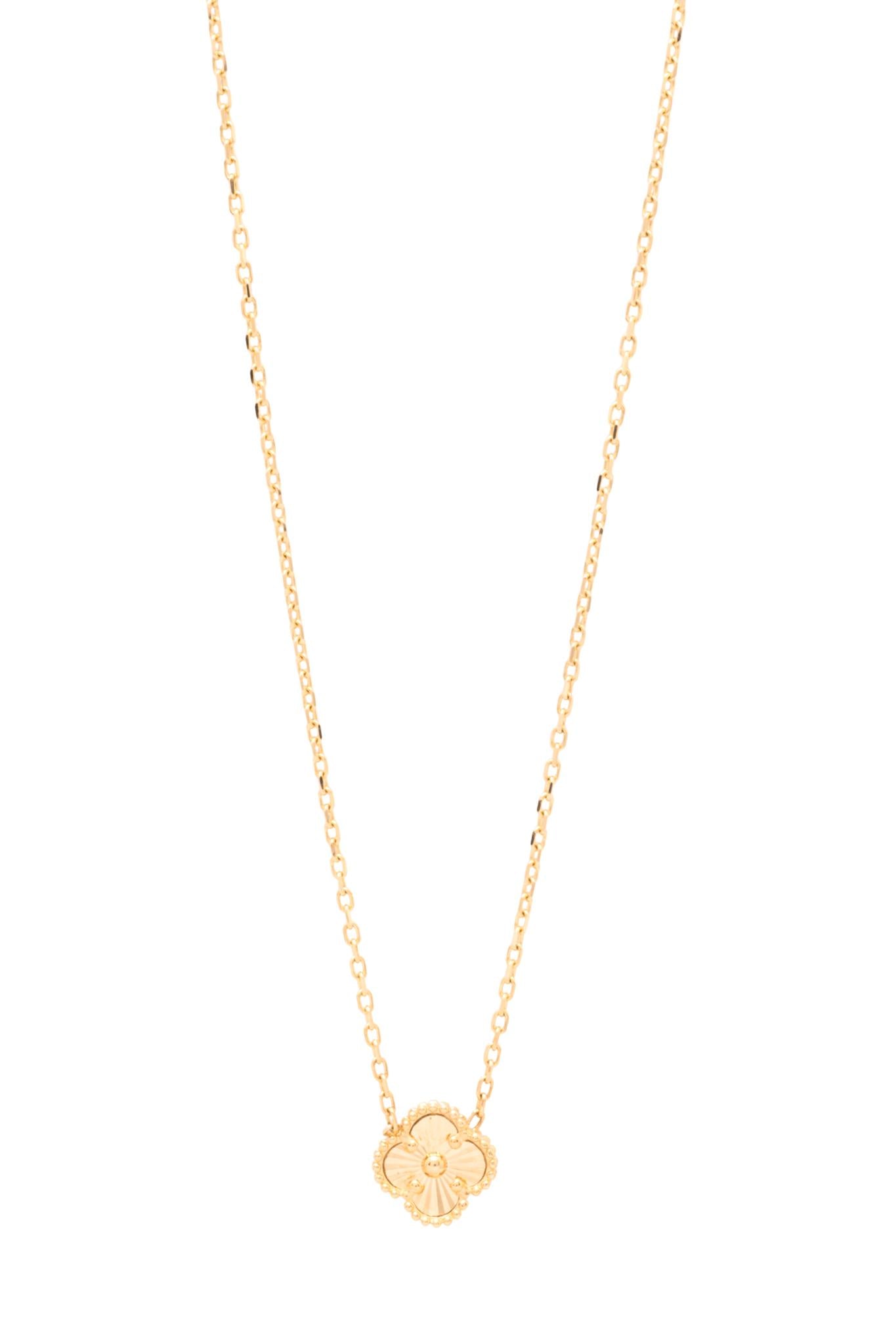 Gargantilla 14 kilates una flor de cuatro pétalos chica en oro dorado..png