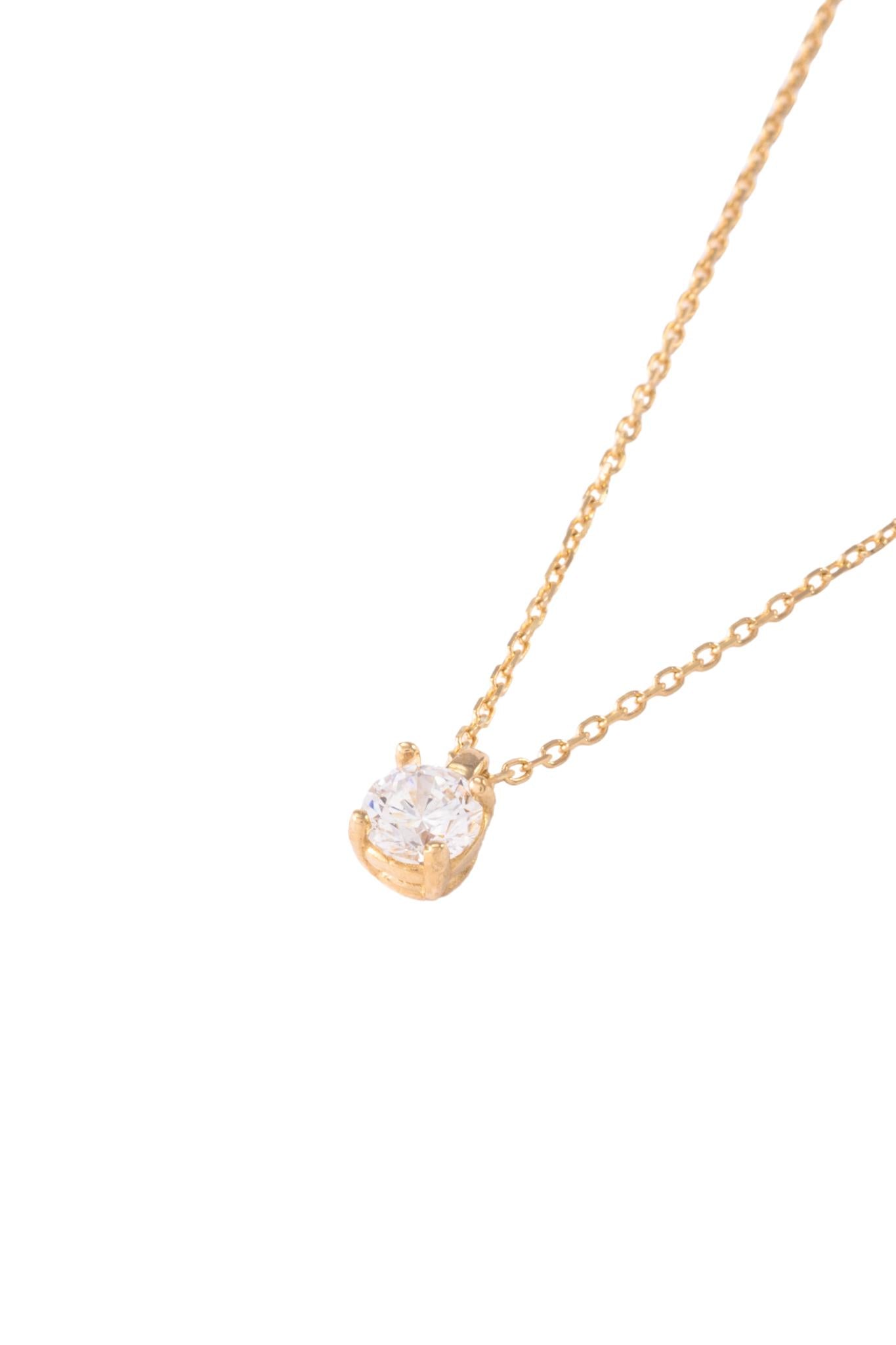 Gargantilla de oro sólido en 10 kilates con dije de zirconia simple blanca..png