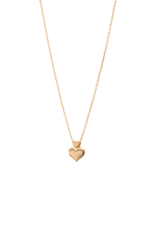 Gargantilla de oro solido en 10 kilates con un corazón liso en el centro.png