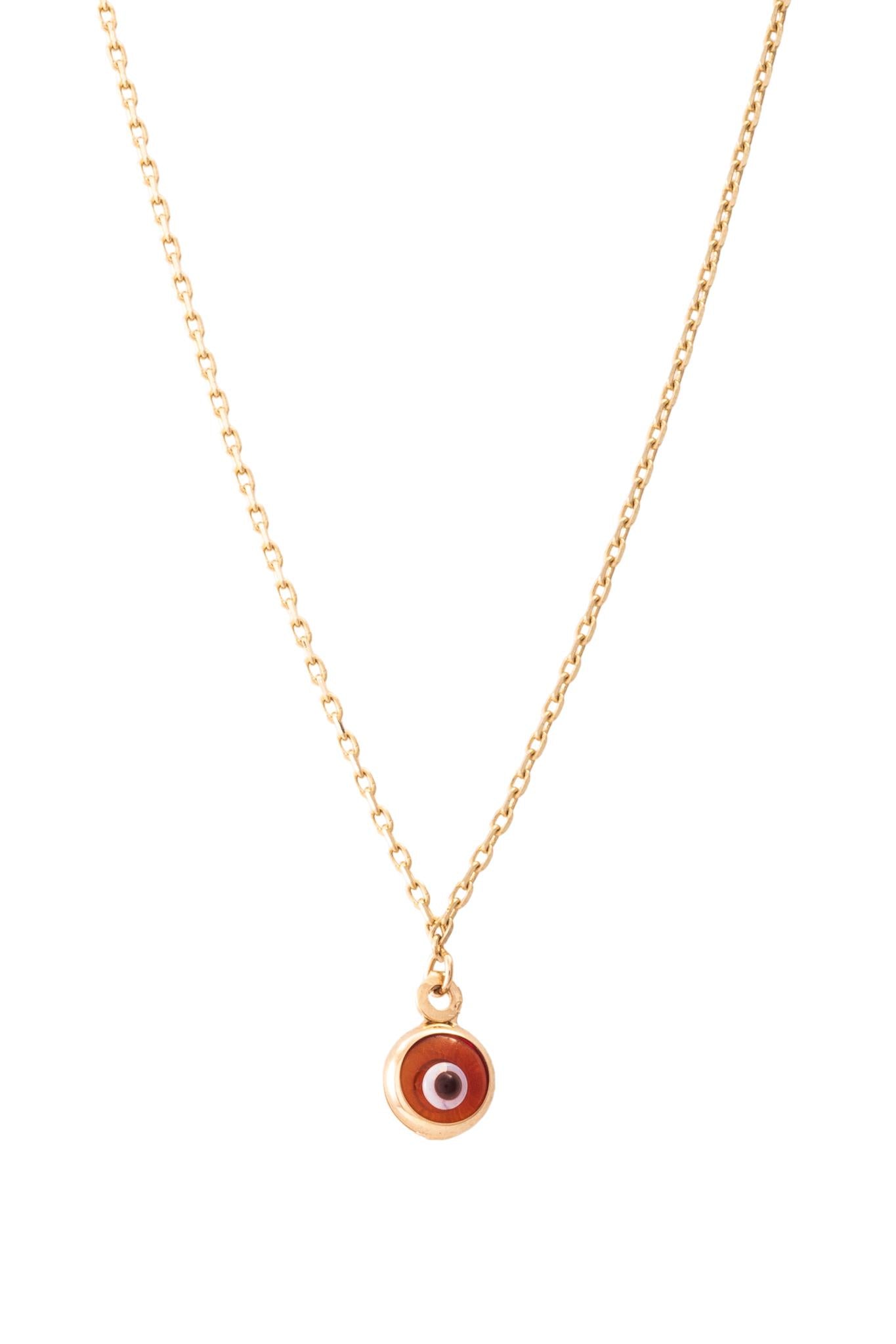 Gargantilla de oro solido en 10 kilates con un ojo turco rojo en el centro.png