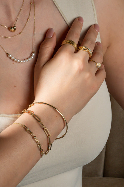 Pulsera en 10 kilates con eslabones alargados y doble cadena