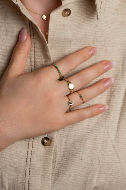 Anillo en 10 kilates con placa lisa circular para grabar