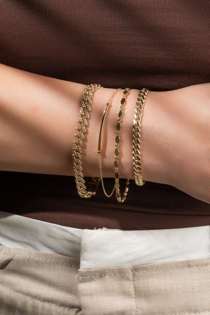 Pulsera en 10 kilates tejido cubano con zirconias
