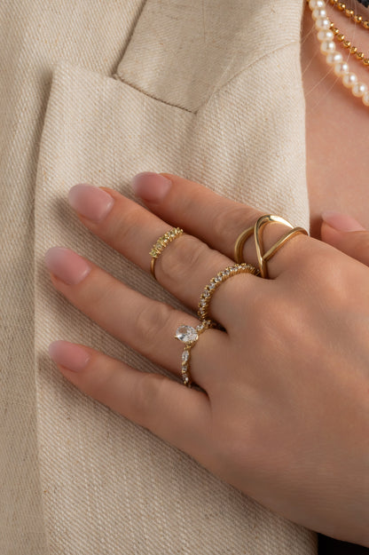 Anillo churumbela 10 kilates con zirconias.