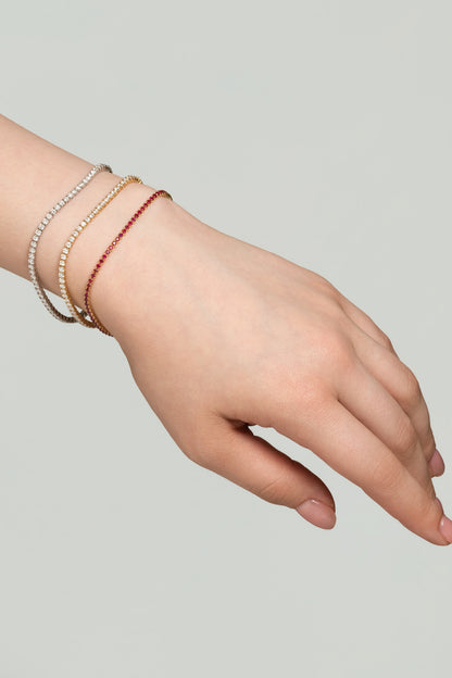 Pulsera de oro sólido en 14 kilates con tenis completa de rubies 1.9 ct.